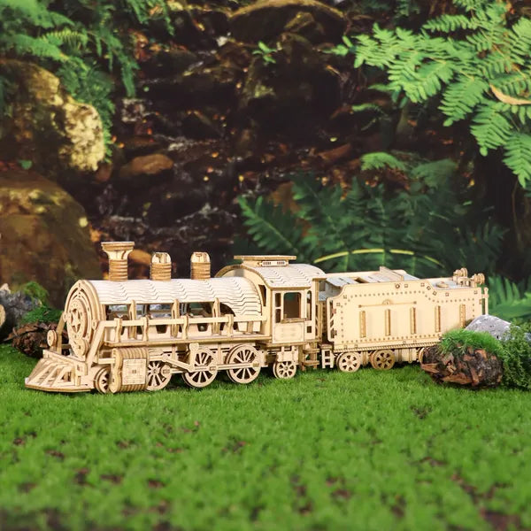 Wooden mechanical train puzzle kit with locomotive and tender